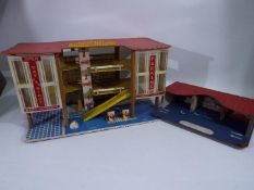 Toyworks - A vintage wood and plastic toy parking garage believed to be made by Toyworks but there