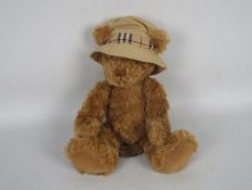 Burberry, Russ Berrie - An unboxed Burberry Fragrance / Russ Berrie soft plush teddy bear.