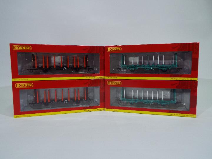 Hornby - 4 x boxed 00 gauge OTA Timber wagons. Two # R6791 Parallel Stanchions No.