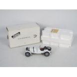 Danbury Mint - A boxed 1:24 scale 1931 Mercedes-Benz SSKL. by Danbury Mint.