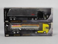 LKW Long Haulers - Two boxed 1:32 scale diecast trucks from LKW.