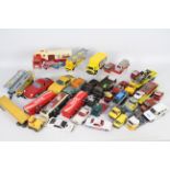 Corgi - Britains - Dinky - A collection of 30 x unboxed diecast vehicles for spares or restoration