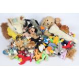 A collection of soft toys to include Ty Beanies, Sooty & Sweep hand puppets,