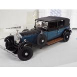 Franklin Mint - A boxed 1:24 scale 1929 Rolls Royce Phantom I Cabriolet De Ville.