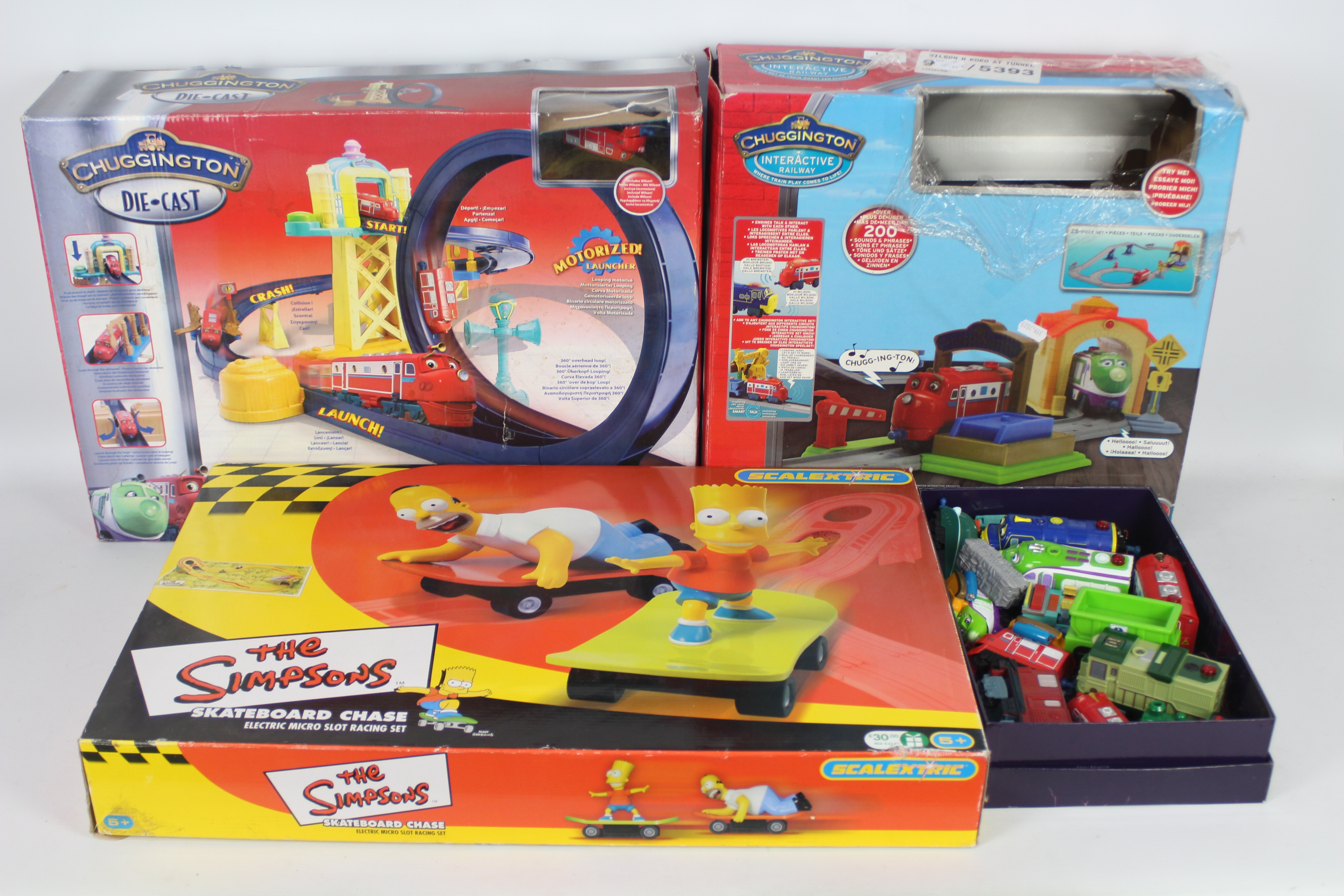 Chuggington - Scalextric - A boxed Chuggington play set along with 2 other boxes of loose