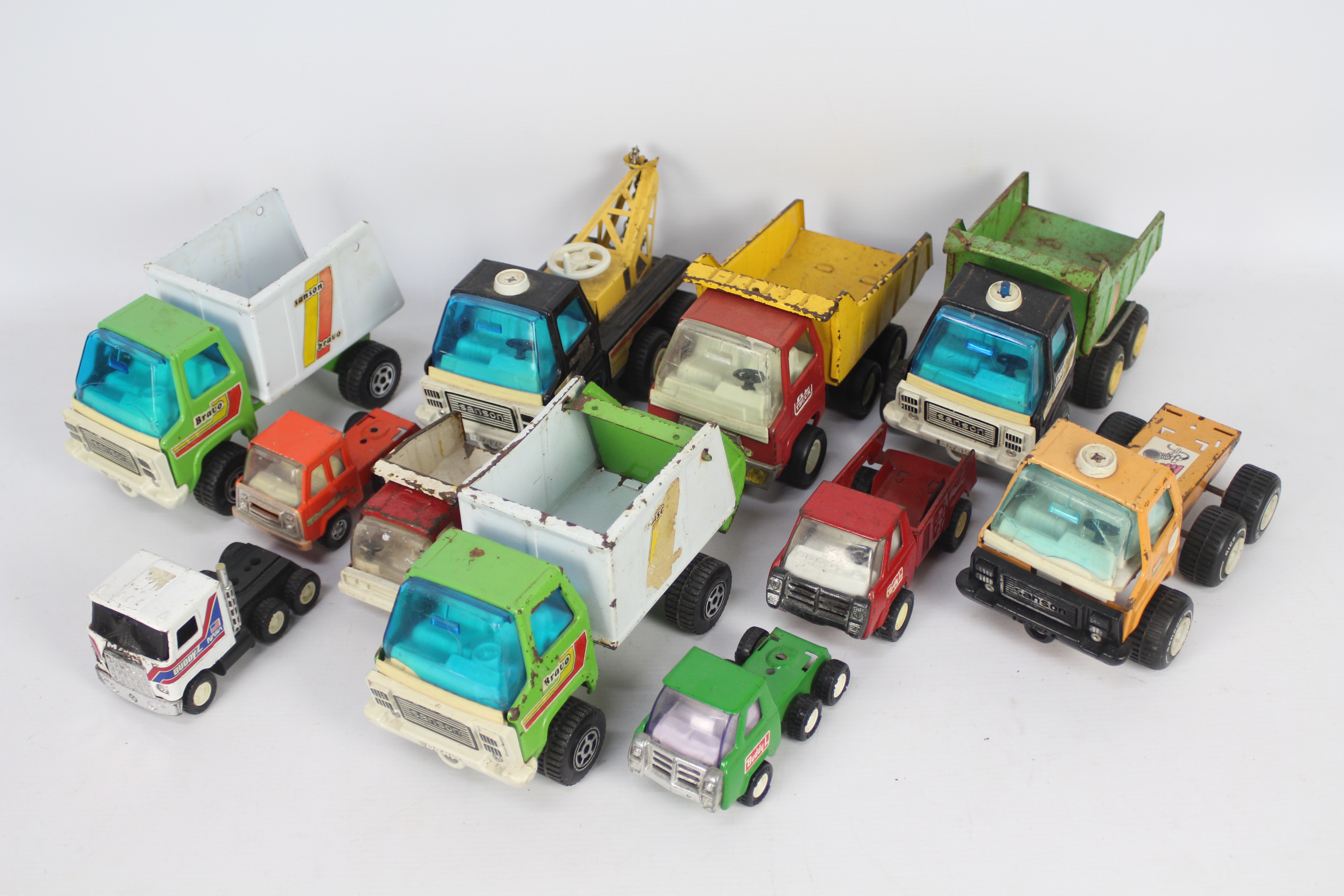 Rico Sanson - Buddy L - Tri-ang - A collection of 11 x unboxed pressed steel trucks including a