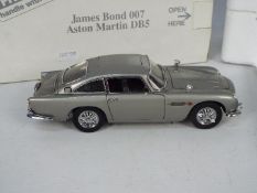 Danbury Mint - A boxed 1:24 scale James Bond 007 Aston Martin DB5 by Danbury Mint.