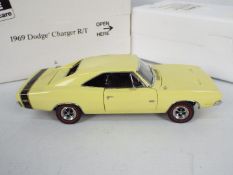 Danbury Mint - A boxed Danbury Mint 1:24 scale 1969 Dodge Charger R/T.