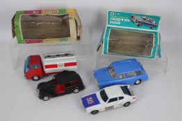 OK Lucky Toys - 4 x vintage plastic models, a boxed Austin 1100 Countryman driving school car,