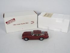 Danbury Mint - A boxed 1:24 scale 1964 Aston Martin DB5 by Danbury Mint.