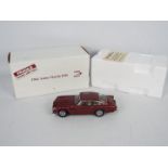 Danbury Mint - A boxed 1:24 scale 1964 Aston Martin DB5 by Danbury Mint.