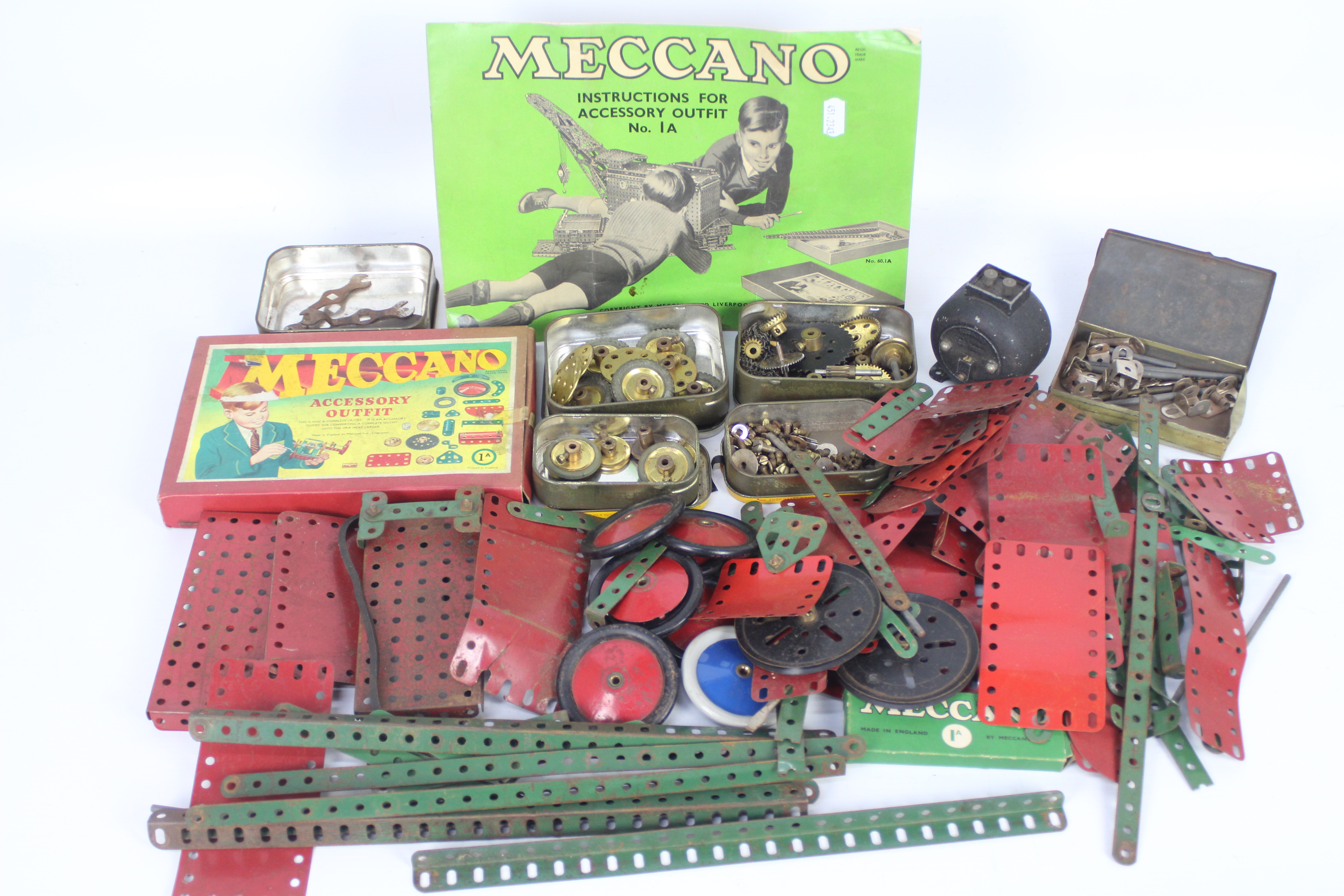 Meccano - A box of assorted Meccano parts including a box and instruction book for Accessory Outfit