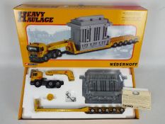 Corgi Heavy Haulage - A boxed Corgi Heavy Haulage Limited Edition CC12003 MAN 6x4 Low Loader with