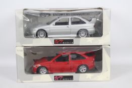 UT Models - 2 x boxed Ford Escort Cosworth models in 1:18 scale,