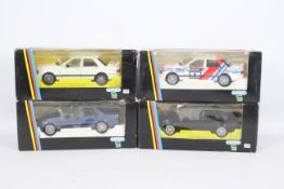 Schabak - 4 x boxed Ford Sierra Sapphire Cosworth models in 1:24 scale including a race car in Fina