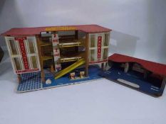 Toyworks - A vintage wood and plastic toy parking garage believed to be made by Toyworks but there