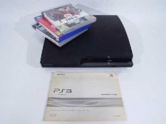 Sony - PS3 - An unboxed PS3 console with instruction book and three games,