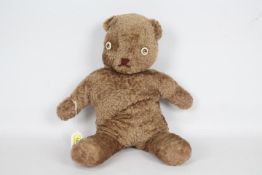 Unnamed - A modern artist made bear which is made to look old,