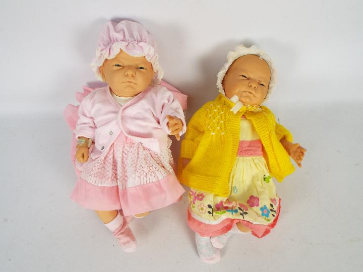 Berjusa - Two unboxed Berjusa vinyl 'new born baby' dolls.