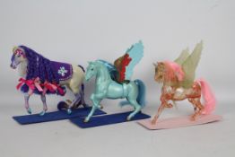 Mattel, She-Ra Princess of Power, Kenner - Three unboxed vintage 1980s action figure horses.