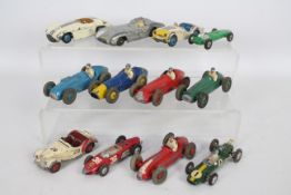 Dinky Toys, Corgi, Crescent - A collection of unboxed diecast sports and racing cars.