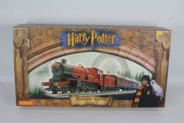 Hornby - A boxed Hornby R1025 OO gauge Hogwarts Express Electric Train Set.