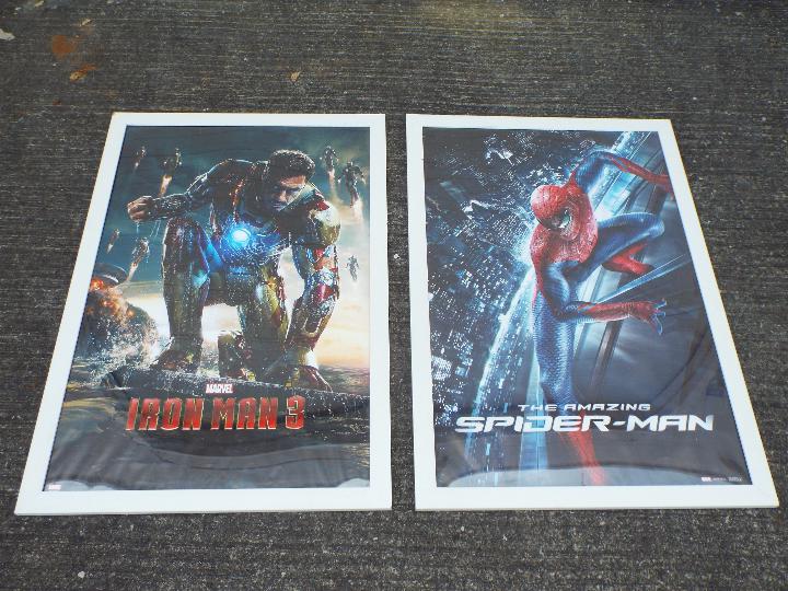 Two frames posters depicting 'The Amazing Spider Man' and 'Iron Man'.