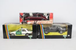 Schabak - 3 x boxed Ford Sierra Sapphire models in 1:24 scale, one Polizei car in green and white,