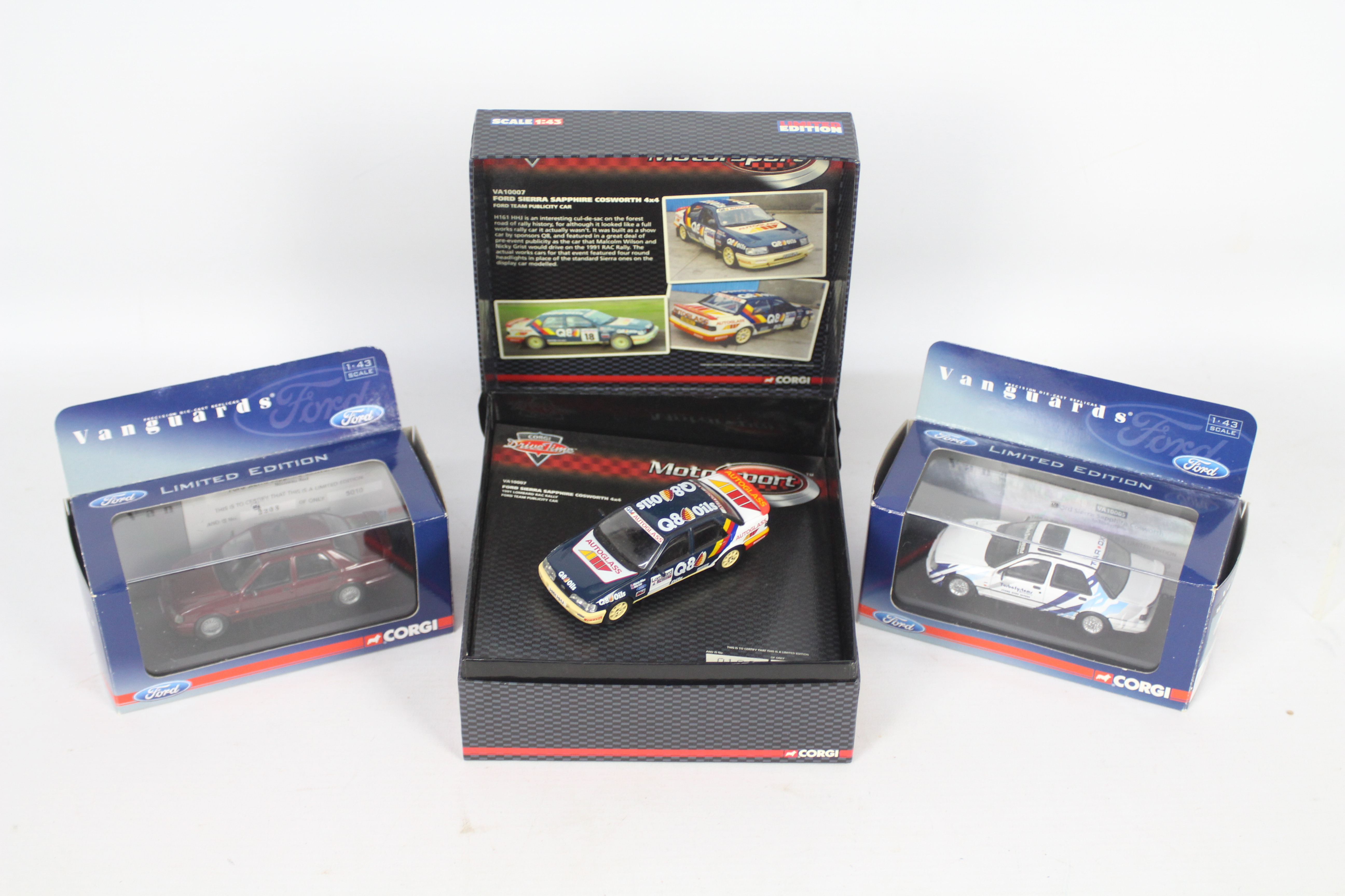 Corgi - 3 x boxed limited edition Ford Sierra Sapphire Cosworth models in 1:43 scale,