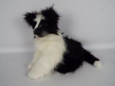 Britta Helberg - A rare black and white dog made by Britta Helberg,