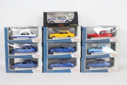 Saico - 10 x boxed cars in 1:32 scale including five Ford Mk1 Escorts and five Subaru Impreza