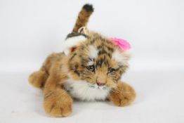 Hama - A Tiger cub with jointed limbs and tail, glass eyes and hard pads and nose.