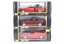 Maisto - Three boxed 'Special Edition' 12:18 scale diecast vehicles from Maisto.