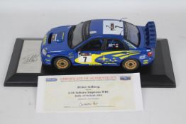 Sunstar - A signed limited edition 1:18 Subaru Impreza WRC Rally Of Finland 2003 car with a plinth