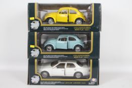 Road Tough - Three boxed diecast 1:18 scale vehicles.