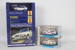 Minichamps - Corgi - 3 boxed Ford Escort models in 1:43 scale,