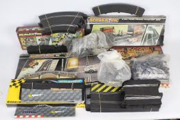 Scalextric - A collection of boxed trackside accessories and loose track pieces including # C190