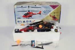 E-Flite - A boxed E-Flite Blade CX2 RC micro helicopter.