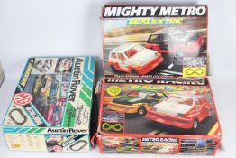 Scalextric - 3 x boxed MG Metro boxed sets with cars, # C.580 Mighty Metro, # C.