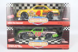 Ertl - Two boxed 1:18 scale diecast mode