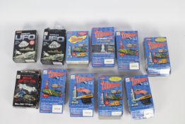 Konami - A collection of 11 boxed Konami 'Candy Toys' from various Gerry Anderson related TV series.