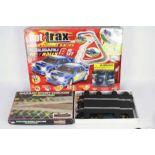 Scalextric - Hot Trax - A boxed radio controlled Subaru Fast Rally set and a Scalextric Hazard