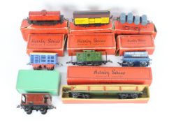 Hornby - A rake of eight boxed Hornby O gauge freight rolling stock.
