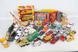 Corgi - Matchbox - Solido - Dinky - Britains - 40 x models including four boxed.