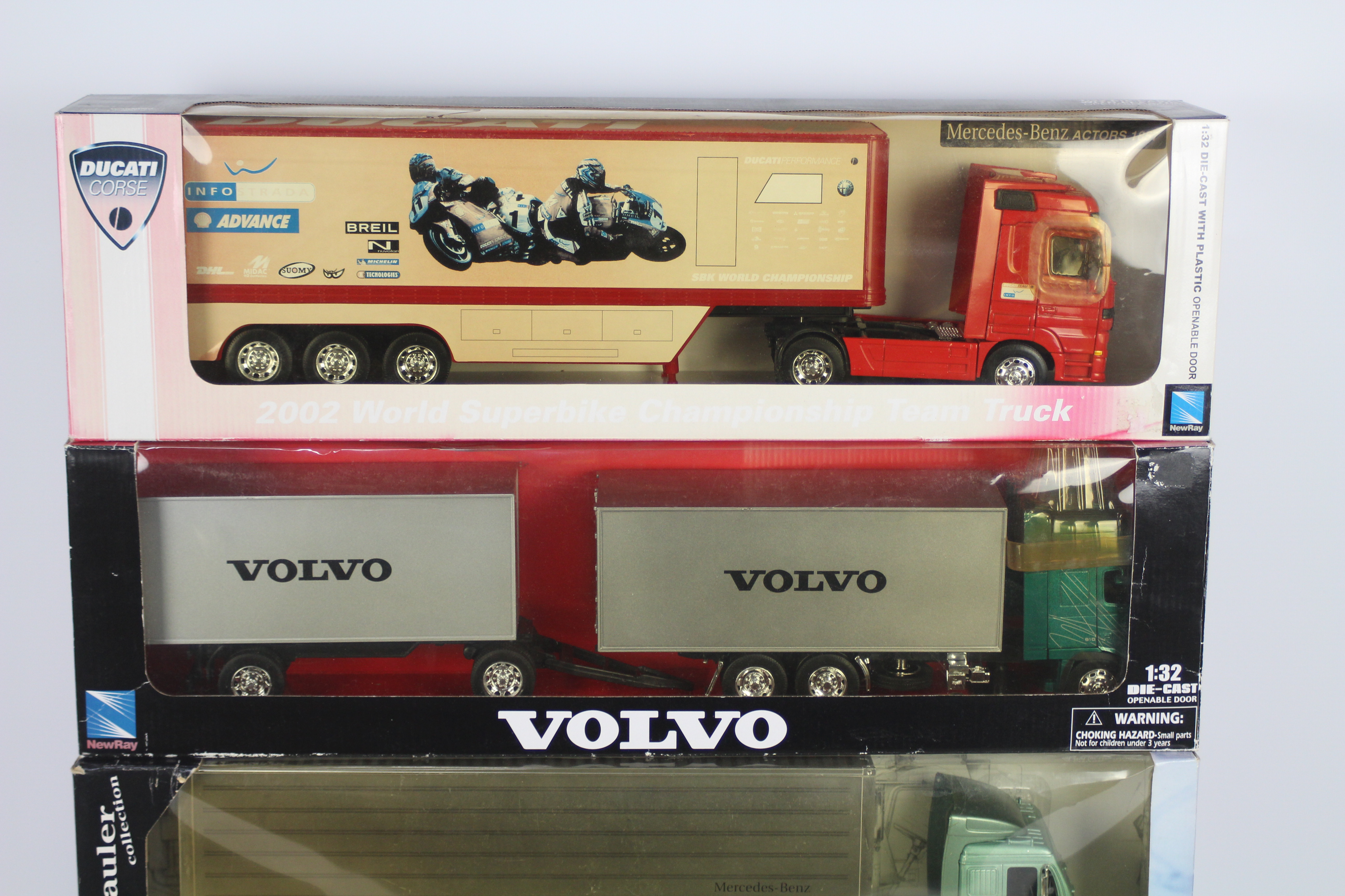 NewRay - 4 x boxed trucks in 1:32 scale, a MAN TG18. - Image 2 of 3