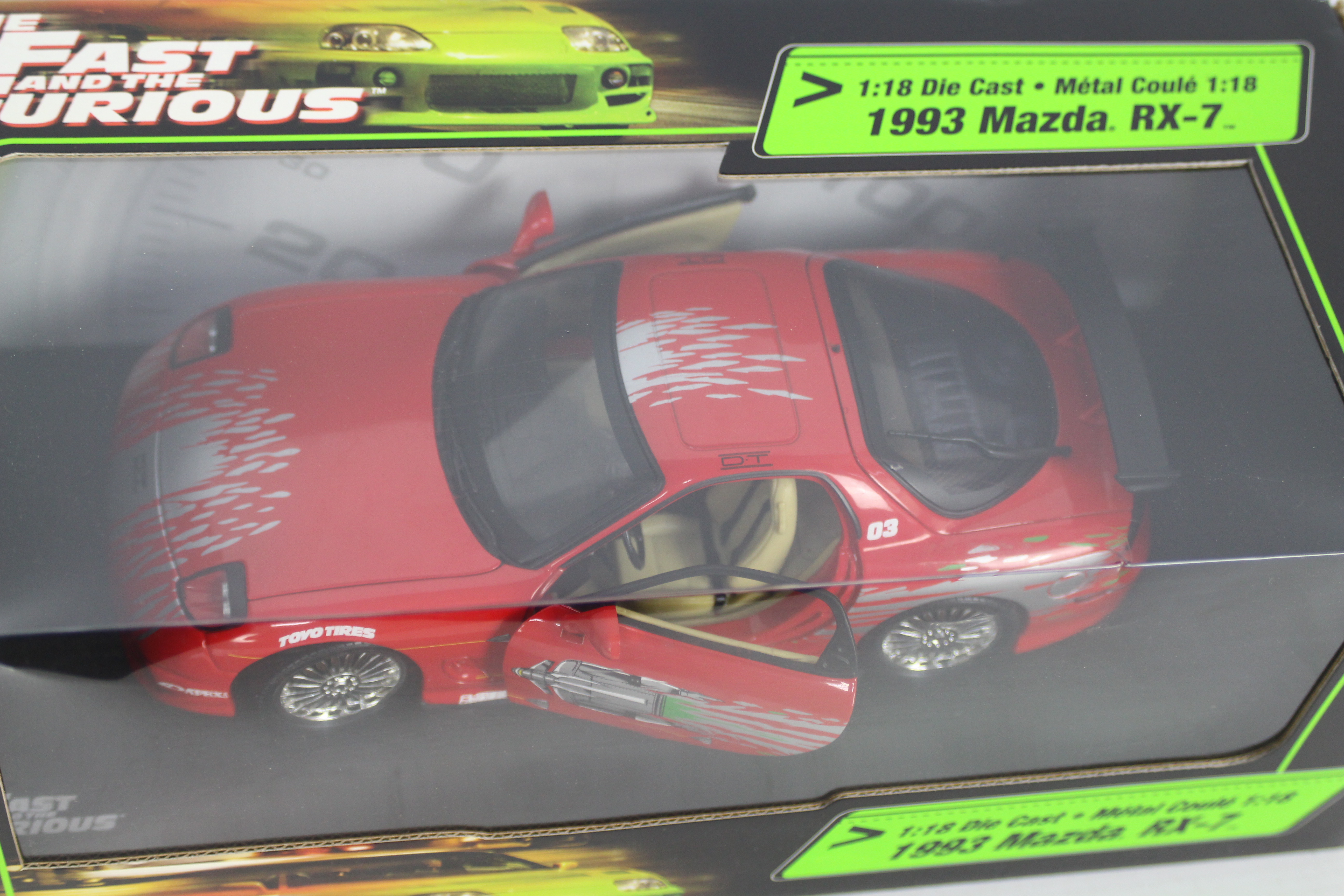 Racing Champions / Ertl - A boxed 1:18 scale 'Fast & Furious' diecast 1993 Mazda RX-7. - Image 3 of 3