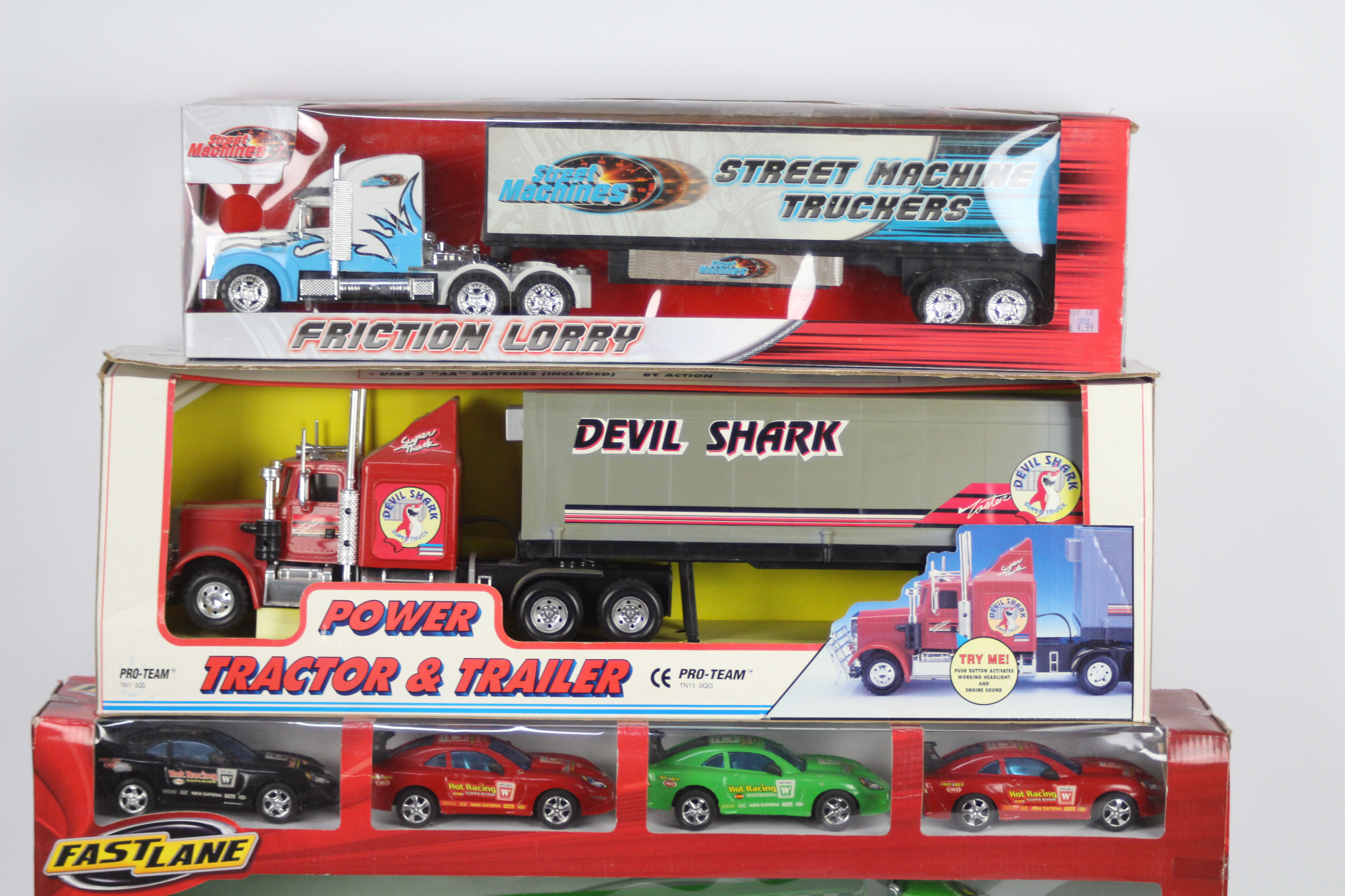 Fast Lane - Pro Team - 3 x boxed American style trucks including the Devil Shark Super Truck, - Image 2 of 3