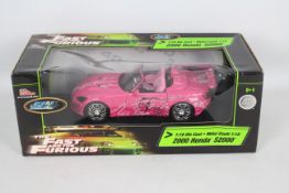 Racing Champions / Ertl - A boxed 1:18 scale 'Fast & Furious' diecast 2000 Honda s2000.