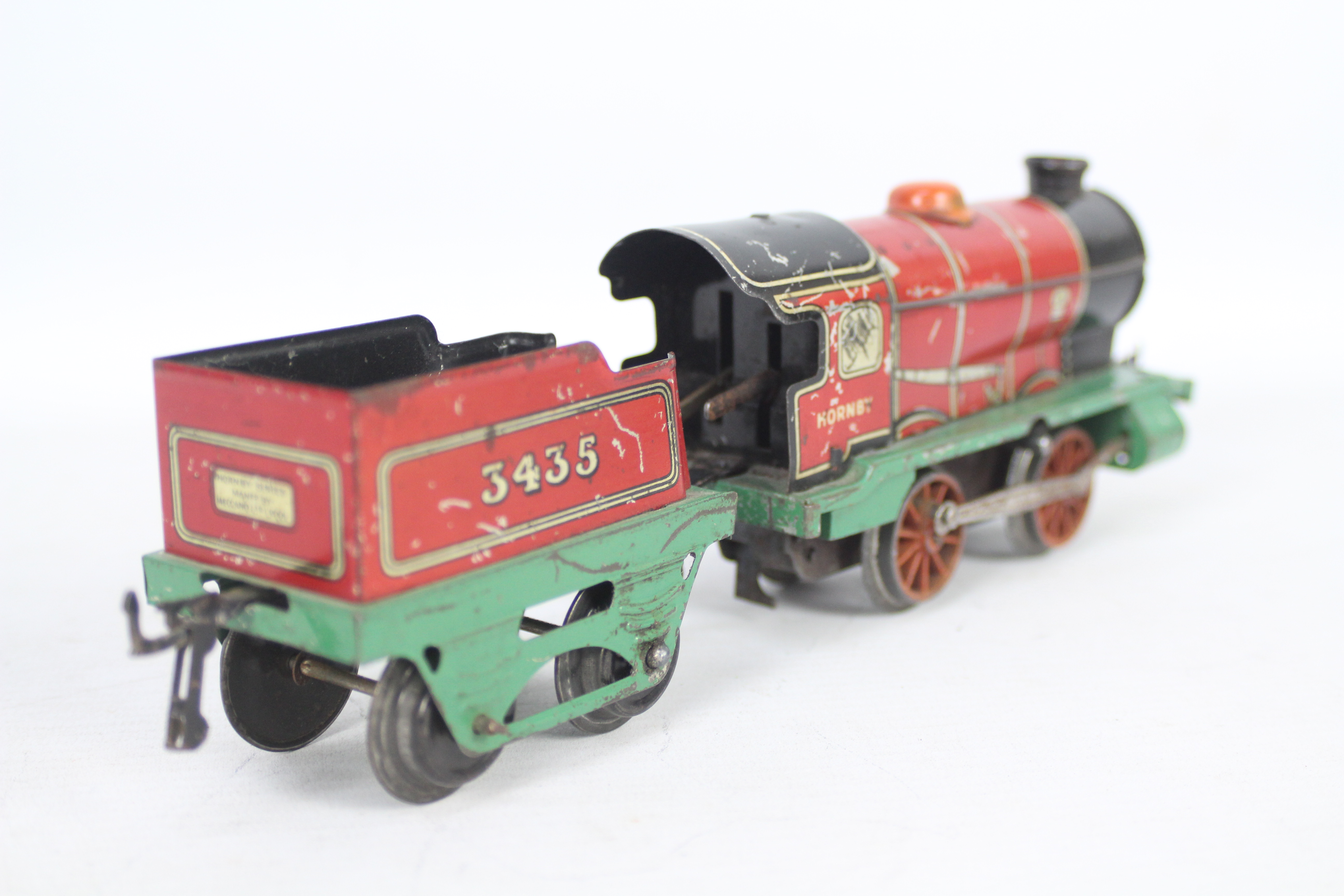Hornby - A 1930s clockwork 0-4-0 tender loco number 3435 in red and green livery. - Image 3 of 3