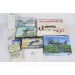 A collection of 10 predominately boxed / bagged plastic model kits and model conversion kits in